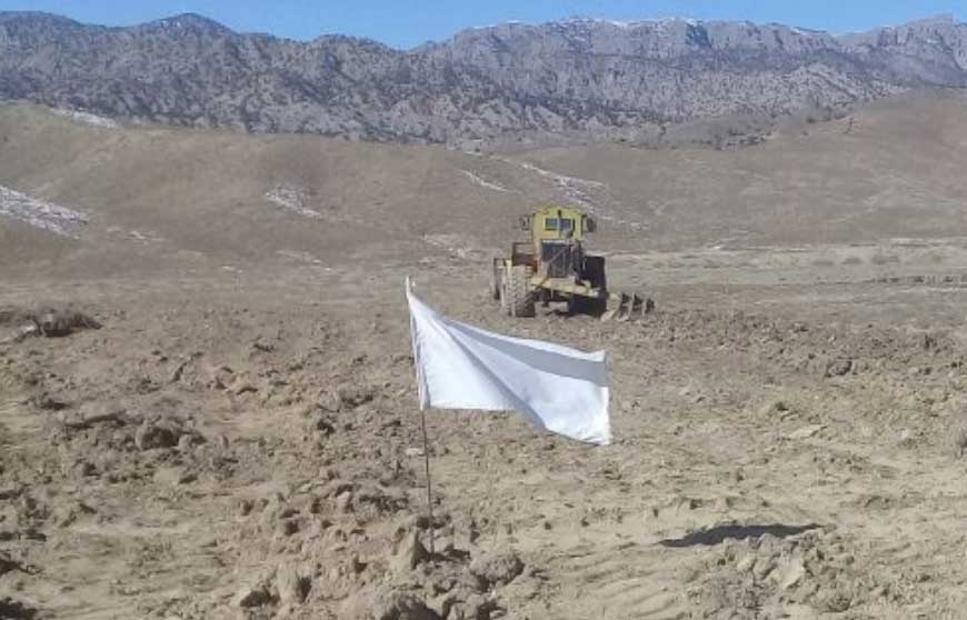 Demined land marked with flags in Afghanistan